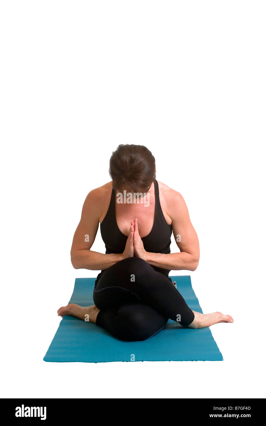 eine attraktive Frau tun Yoga-Posen isoliert mit Textfreiraum Stockfoto