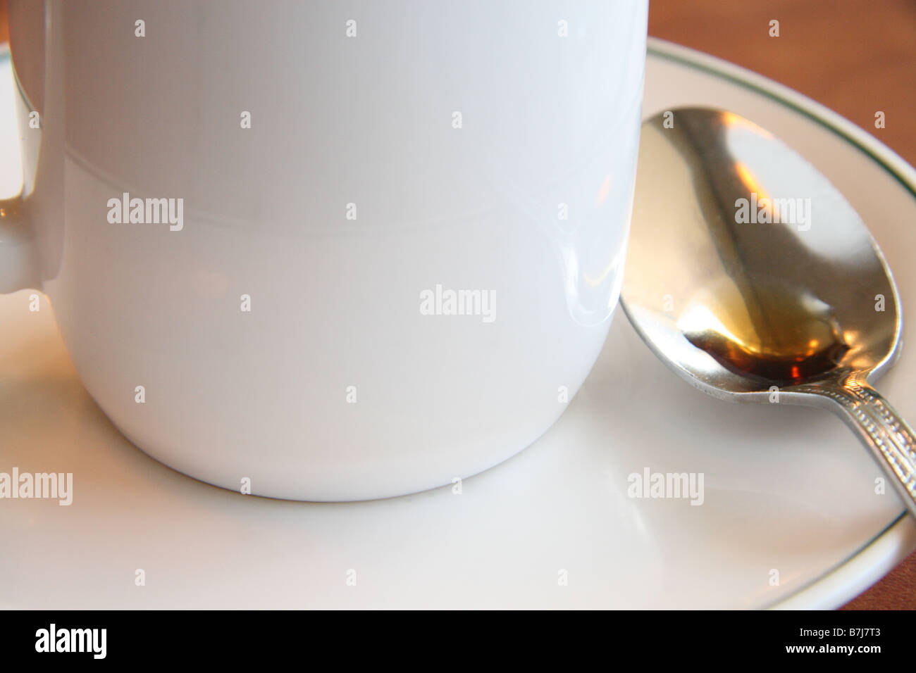 Kaffeetasse, Löffel & Untertasse-1 Stockfoto