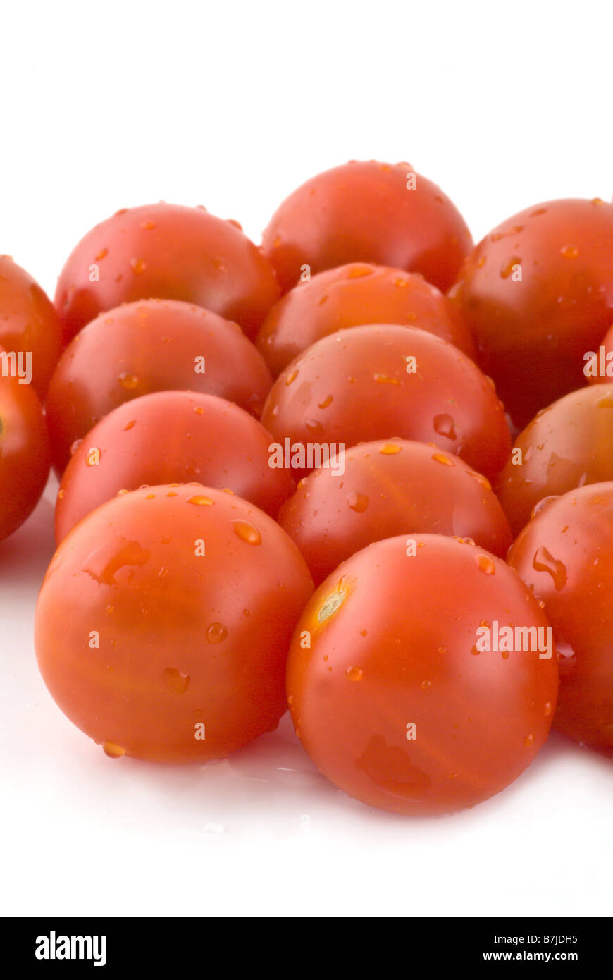 Nahaufnahme Foto von mehreren Tomaten isoliert auf weiß Stockfoto