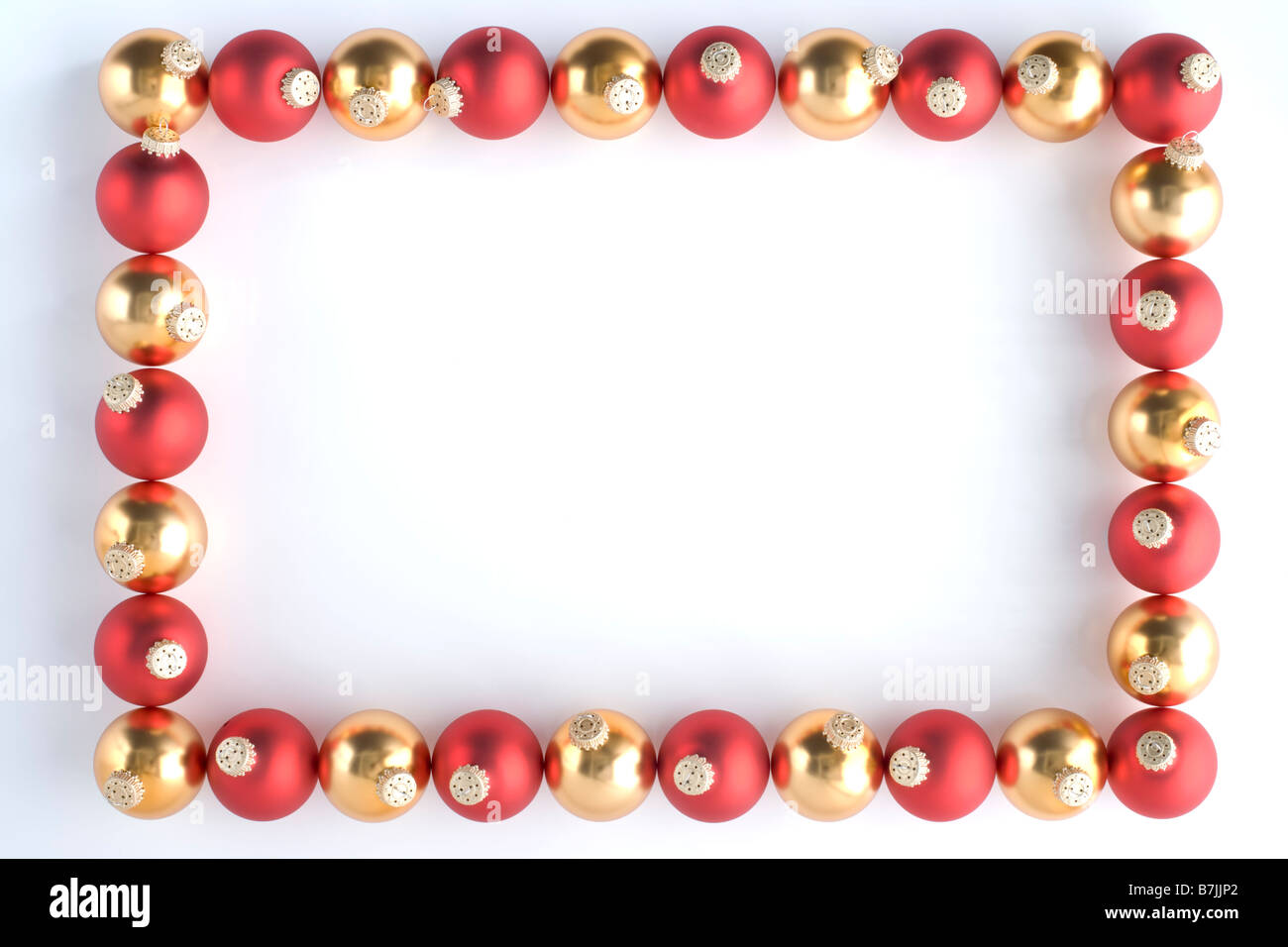 Grenze von rot und Gold Kugeln vor weißem Hintergrund gemacht Stockfoto