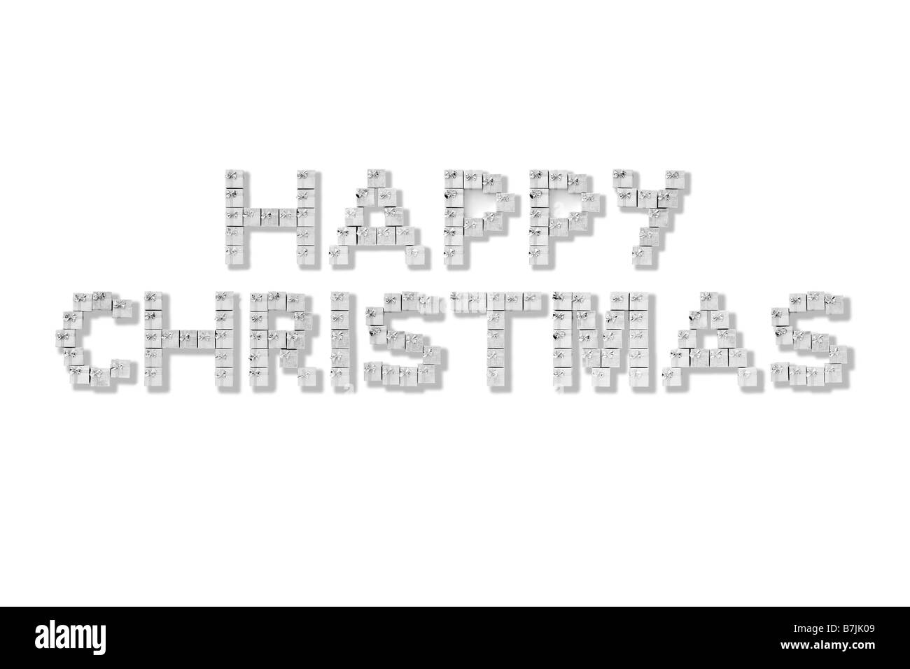 Silber Geschenkboxen Rechtschreibung Frohe Weihnachten auf weißem Hintergrund Stockfoto