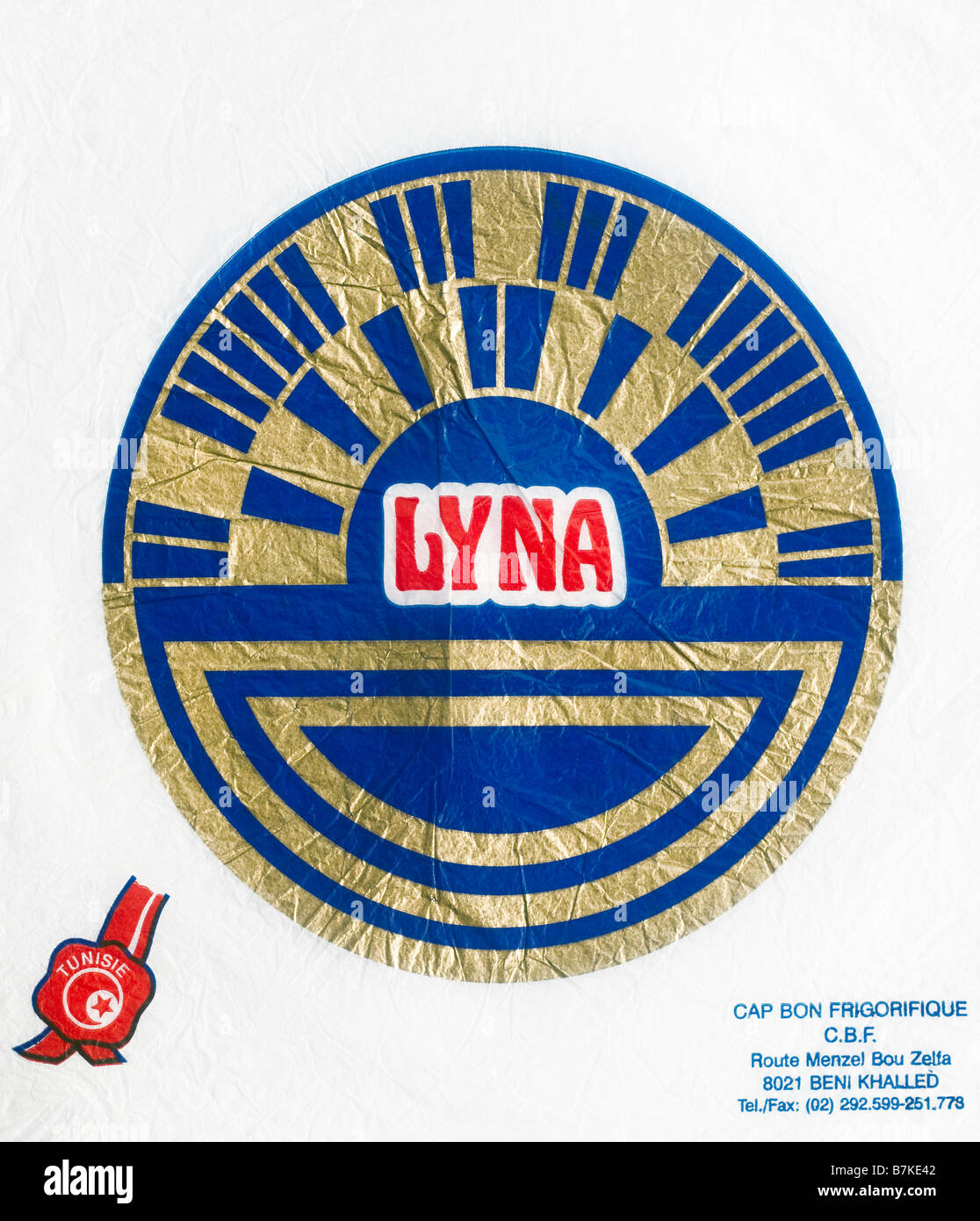 Gedruckte Ephemera / Zitrus Früchte Wrapper aus Tunesien - Lyna / Blau Gold Disk Abbildung auf Seidenpapier. Stockfoto
