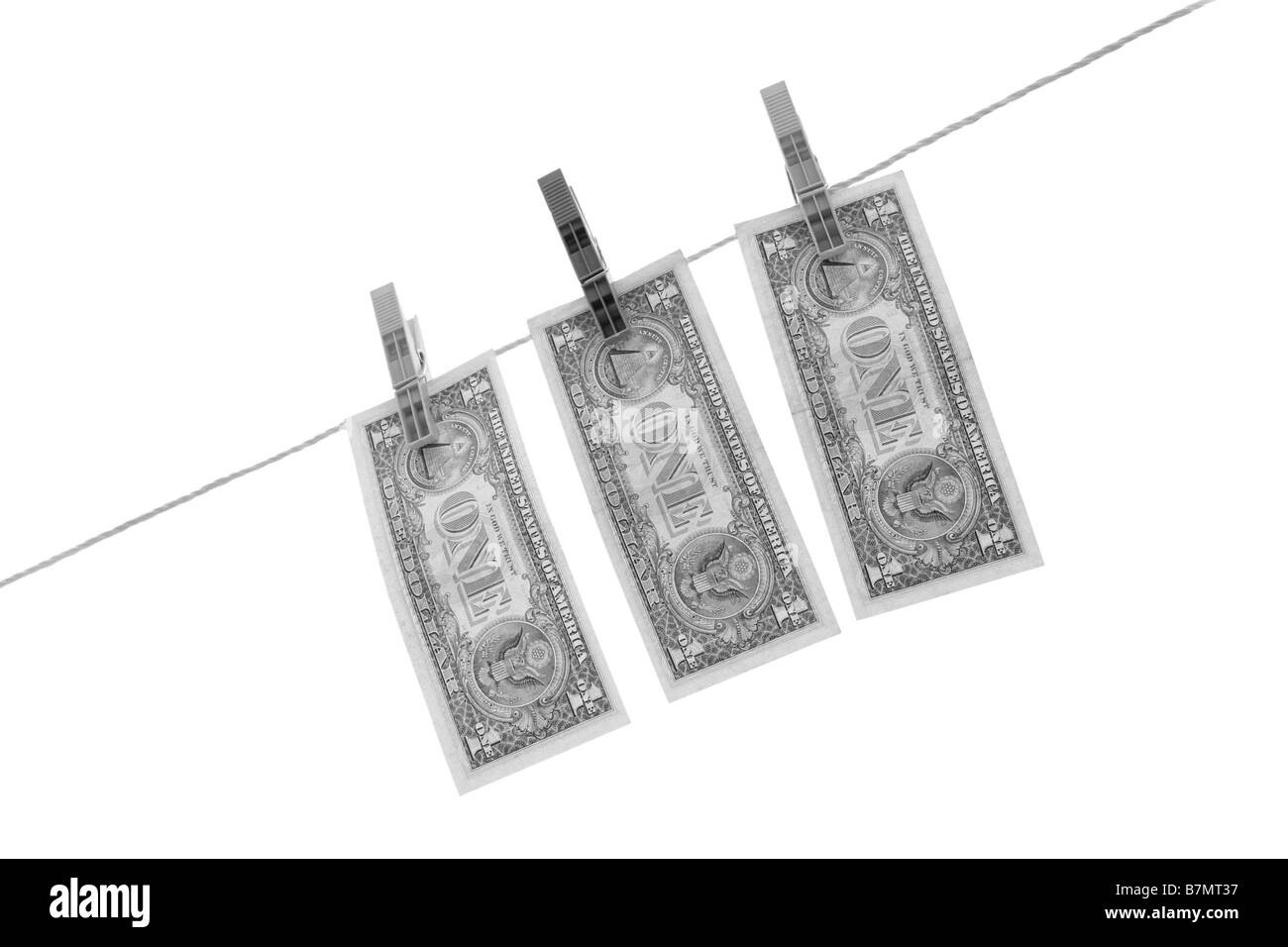 Dollar auf einer Wäscheleine; isoliert auf weißem Hintergrund Stockfoto