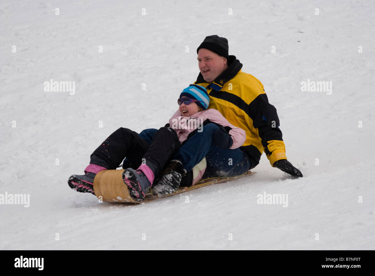 Schlittenfahren Riverdale Park East Toronto Kanada Winter-Szene Stockfoto