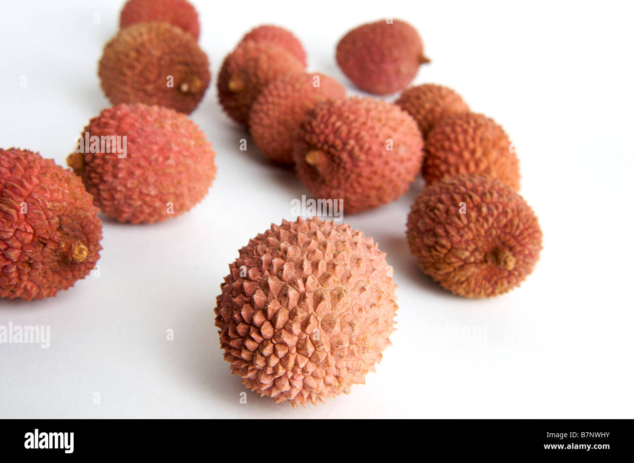 Frische Litschis zeigen leuchtende Farben und einzigartige Texturen von Litchi chinensis Stockfoto