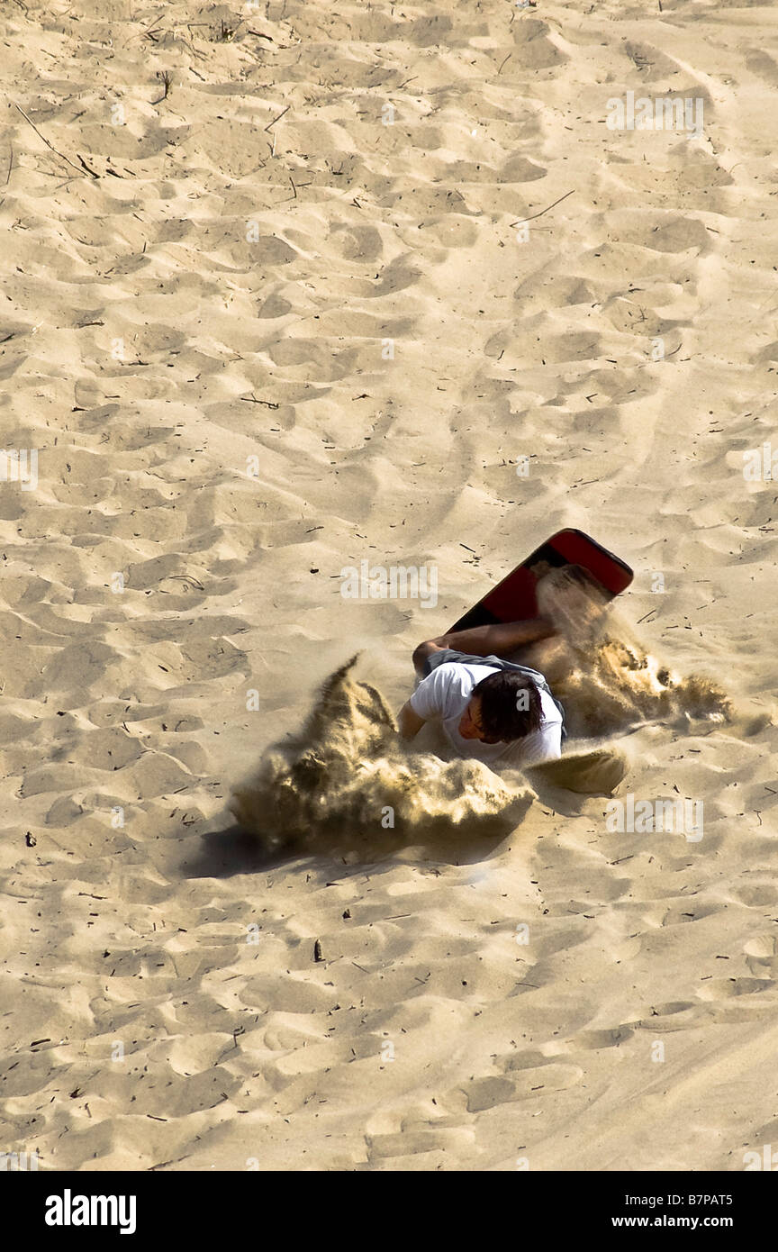 Fallende Sandboarder auf der Oregon Dunes. Stockfoto