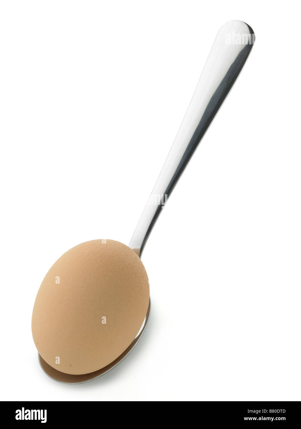 Ei und Löffel Stockfoto