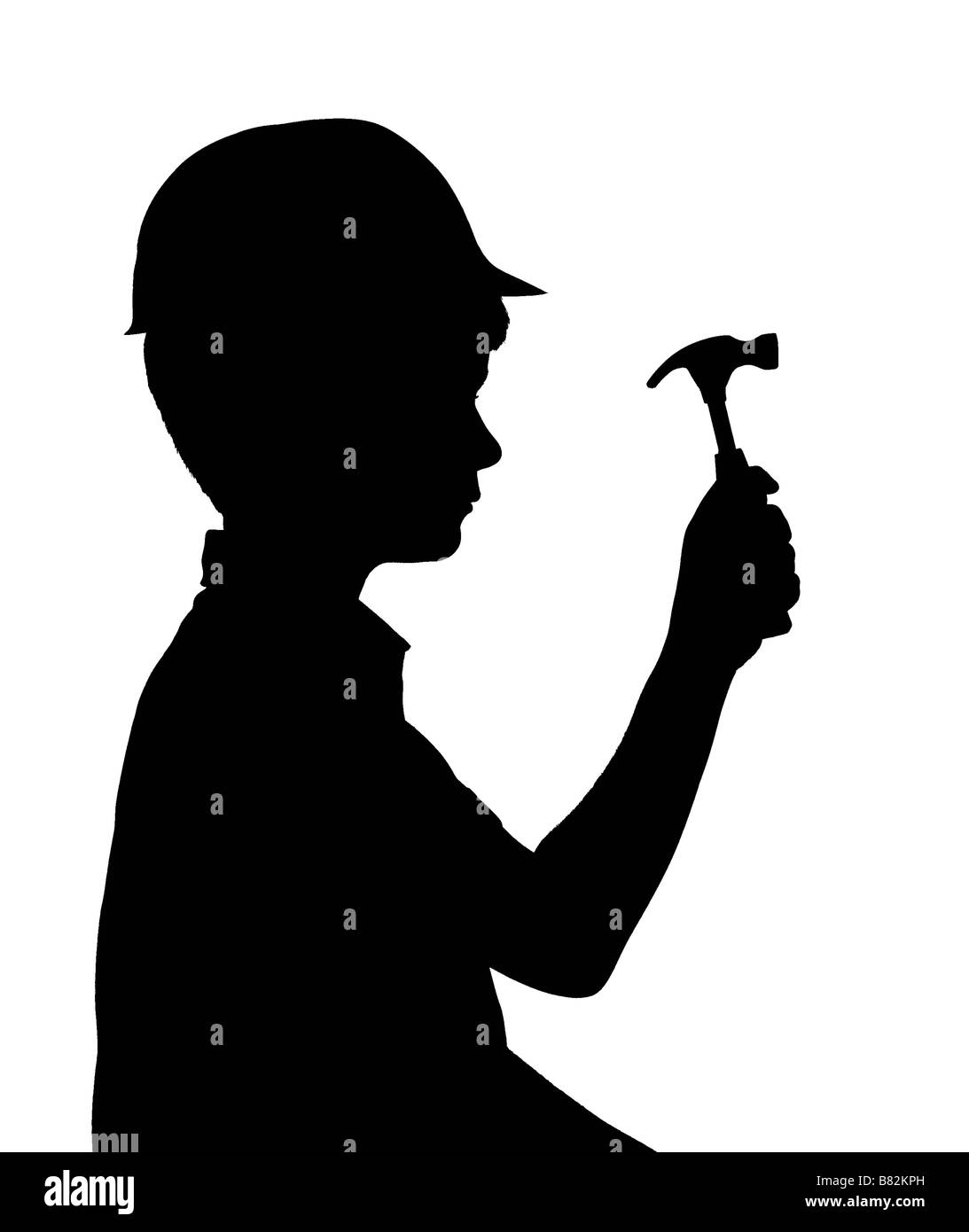 Silhouette der junge im Helm mit einem hammer Stockfoto