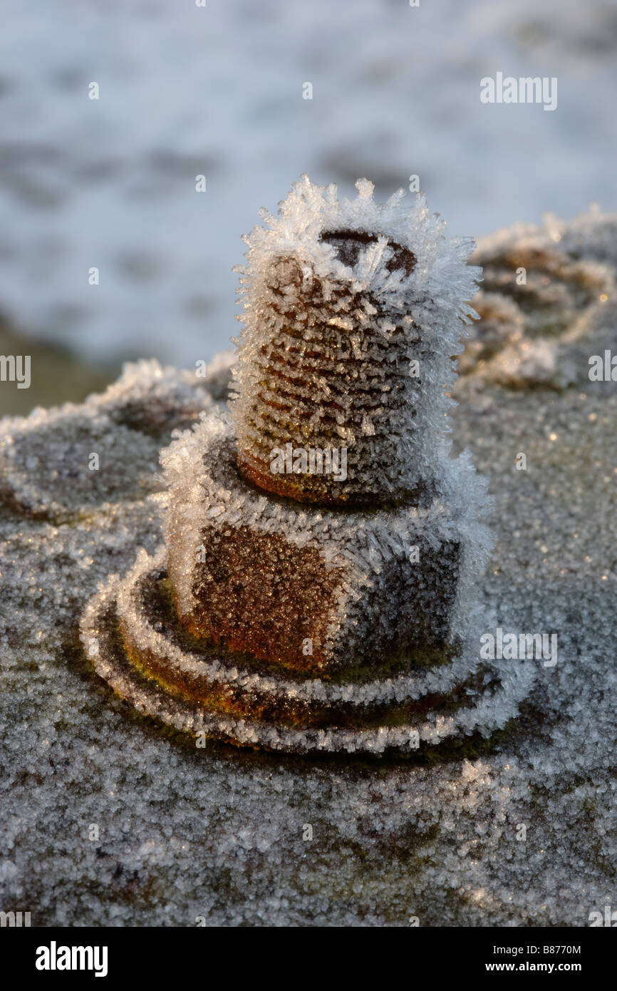 Frost auf rostigen Metall Landmaschinen Stockfoto