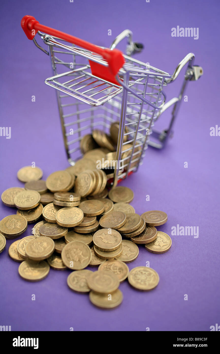 Einkaufswagen leeren Münzen Stockfoto