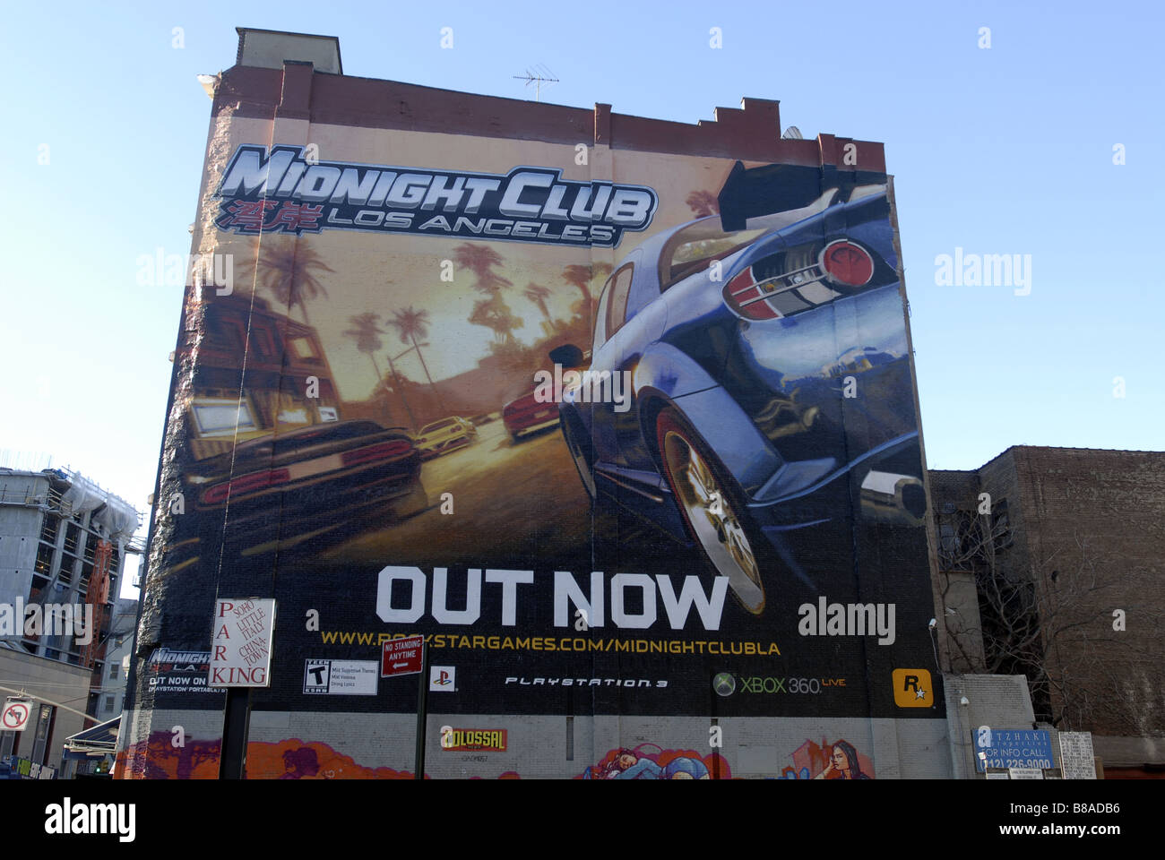 Eine Hinweistafel an der Seite eines Gebäudes an der Canal Street in New York für RockStar Games Midnight Club Los Angeles Videospiel Stockfoto