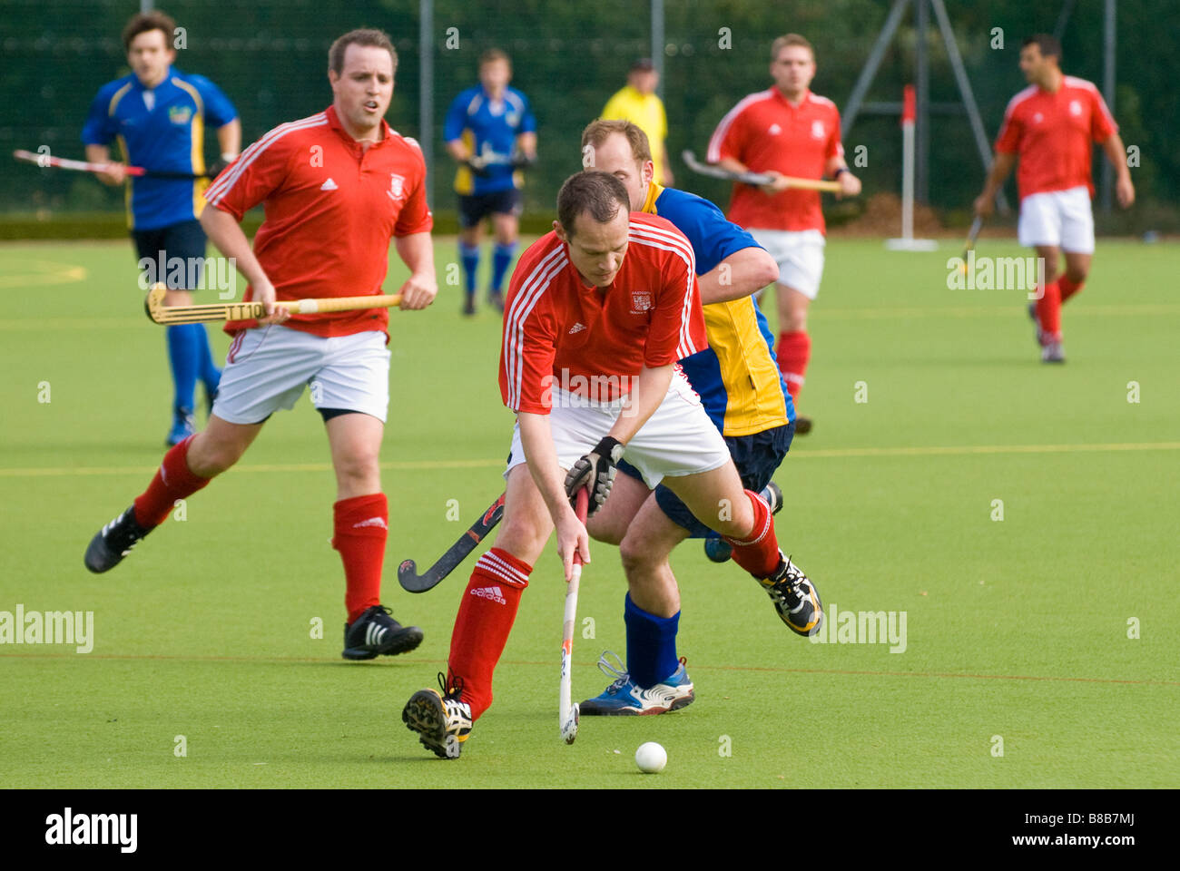 Männer spielen Hockey Stockfoto