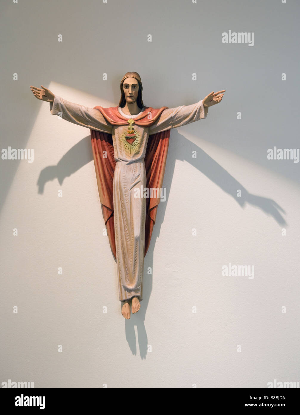 Jesus Christus-Statue an Wand Stockfoto