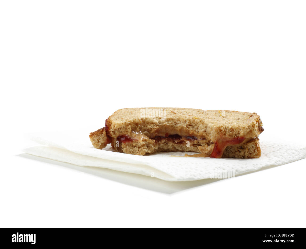Erdnussbutter und Marmelade Sandwich mit Biss herausgenommen Stockfoto