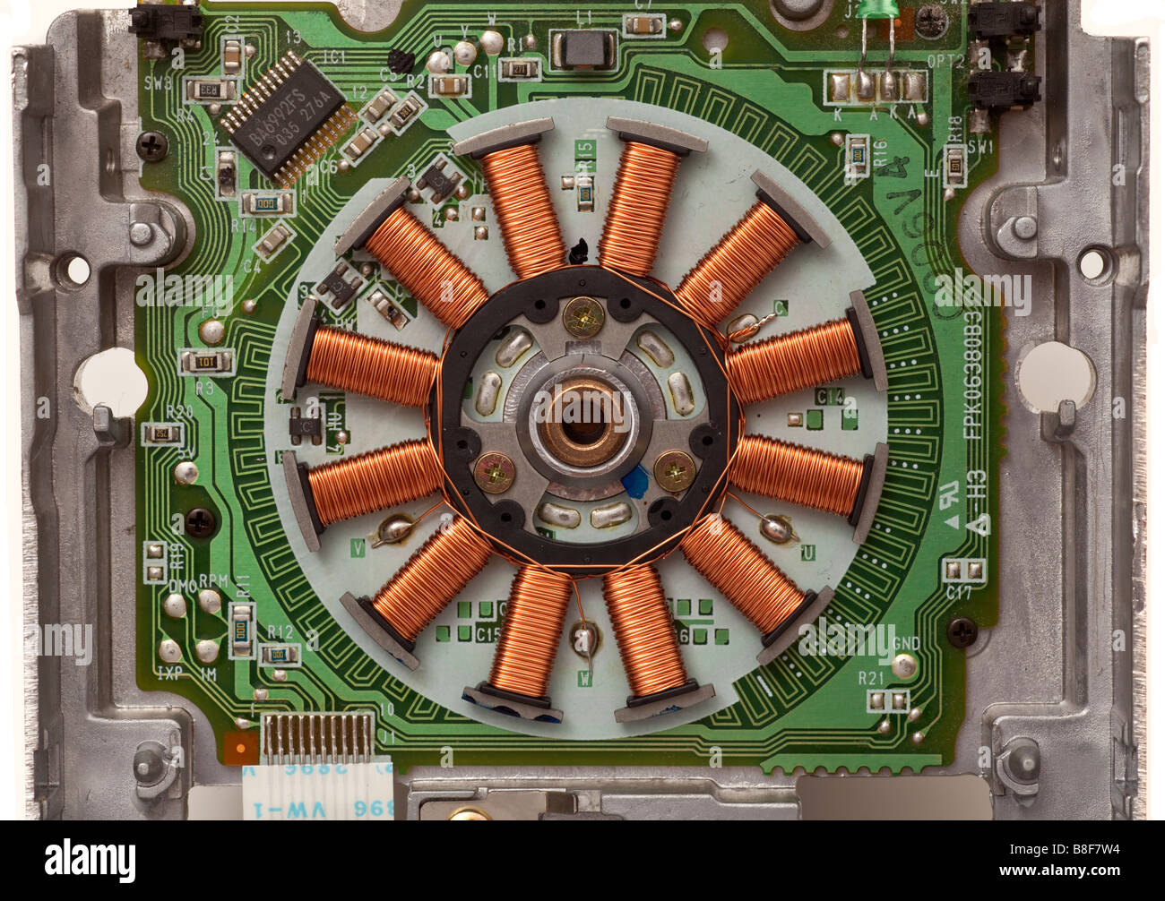 Elektromotor Kupfer Spule Wicklungen wie in einem Computer-floppy-Laufwerk gefunden Stockfoto