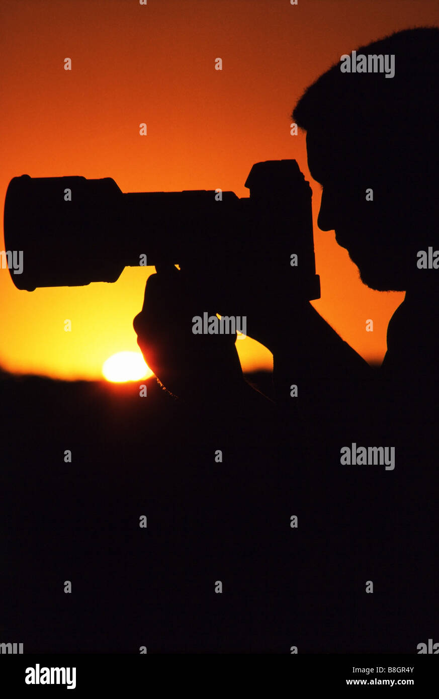 Leute arbeiten, Fotograf im Studio mit Modelle und Requisiten und Stylisten. Stockfoto