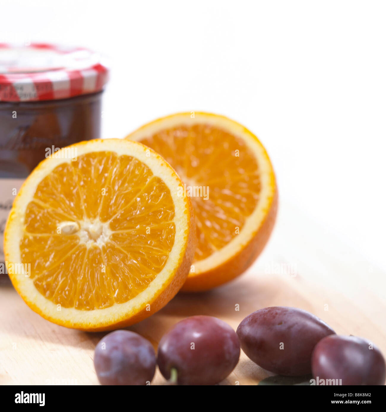 Orangen und Pflaumen Stockfoto