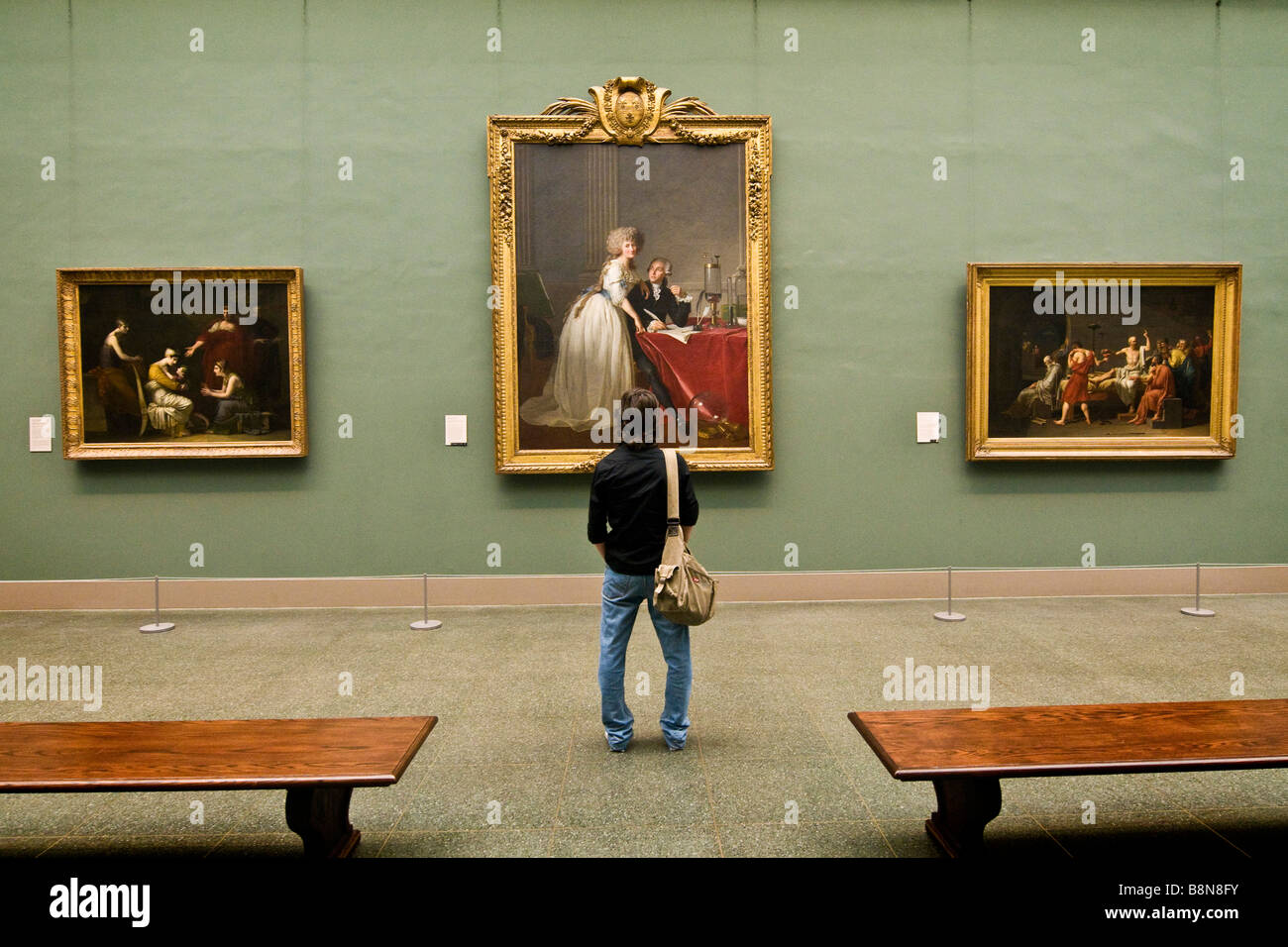 Besucher, die eine Sammlung von klassischen Gemälden, Metropolitan Museum of Art anzeigen Stockfoto