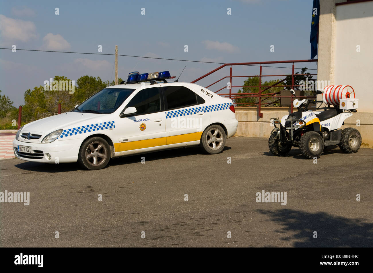 Spanische lokale Polizeiauto Policecar und Quad Bike Spanien Stockfoto