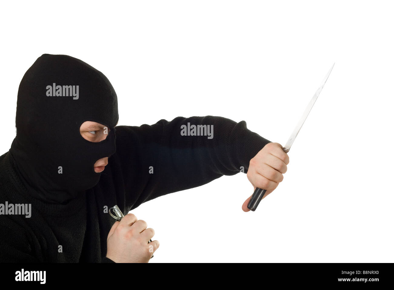 Terroristen in schwarze Maske mit Messer und Hand Granate Stockfoto