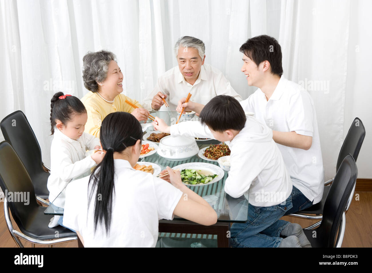 Drei-Generationen-Familie Mahlzeit Stockfoto