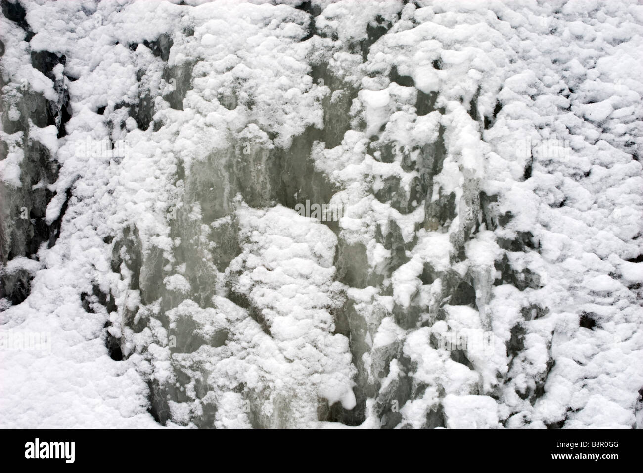 Gefrorenen Wasserfall Eis Oberflächendetails Closeup. Stockfoto