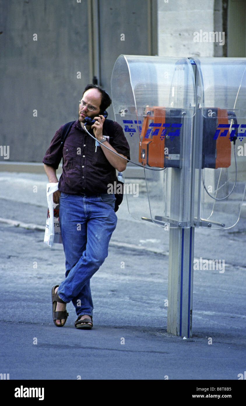 Mann, öffentliches Telefon, Israel, Jerusalem anlaufen Stockfoto
