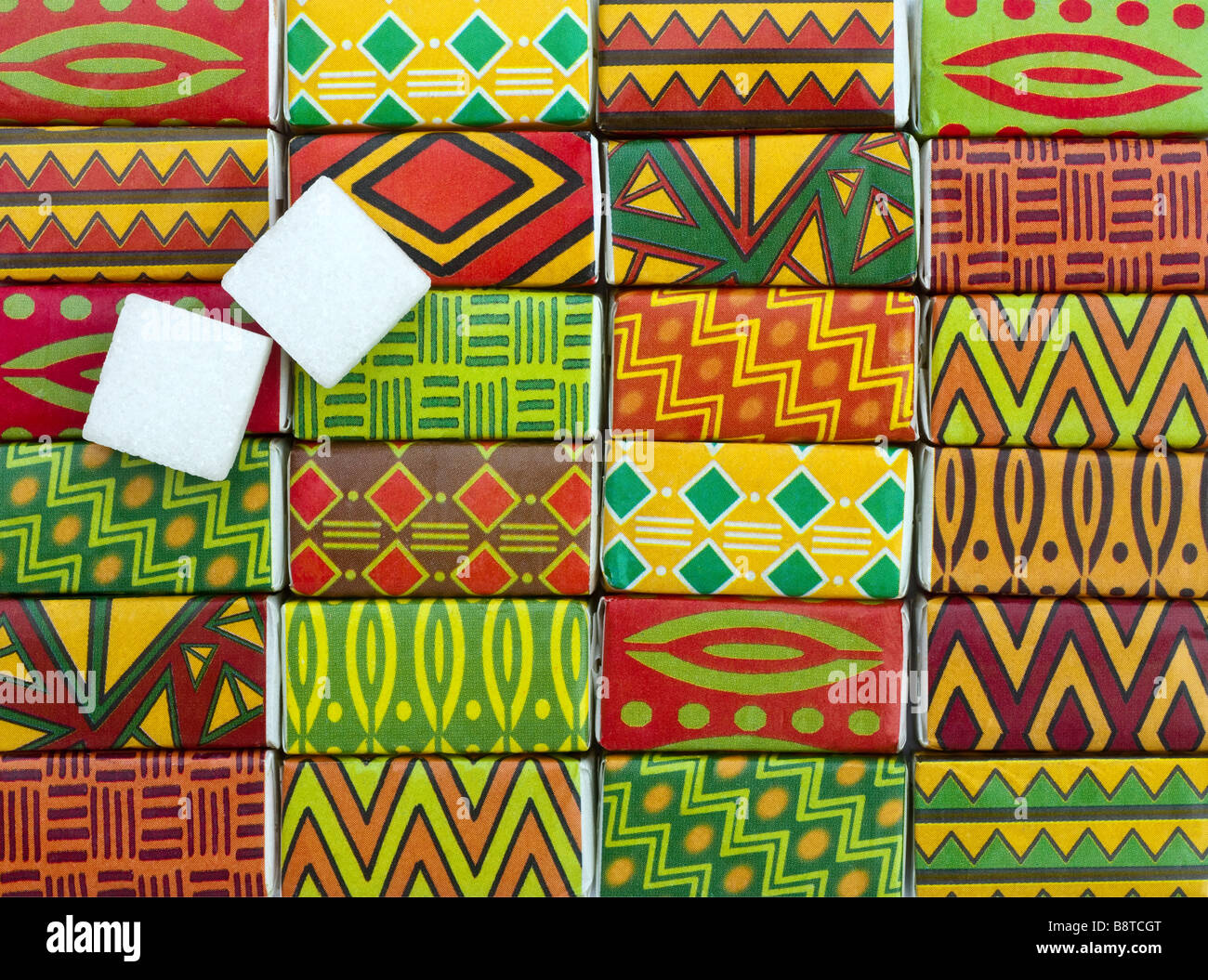 Zucker Würfel Papier Wrapper - Darstellung afrikanischer Kunst. Stockfoto