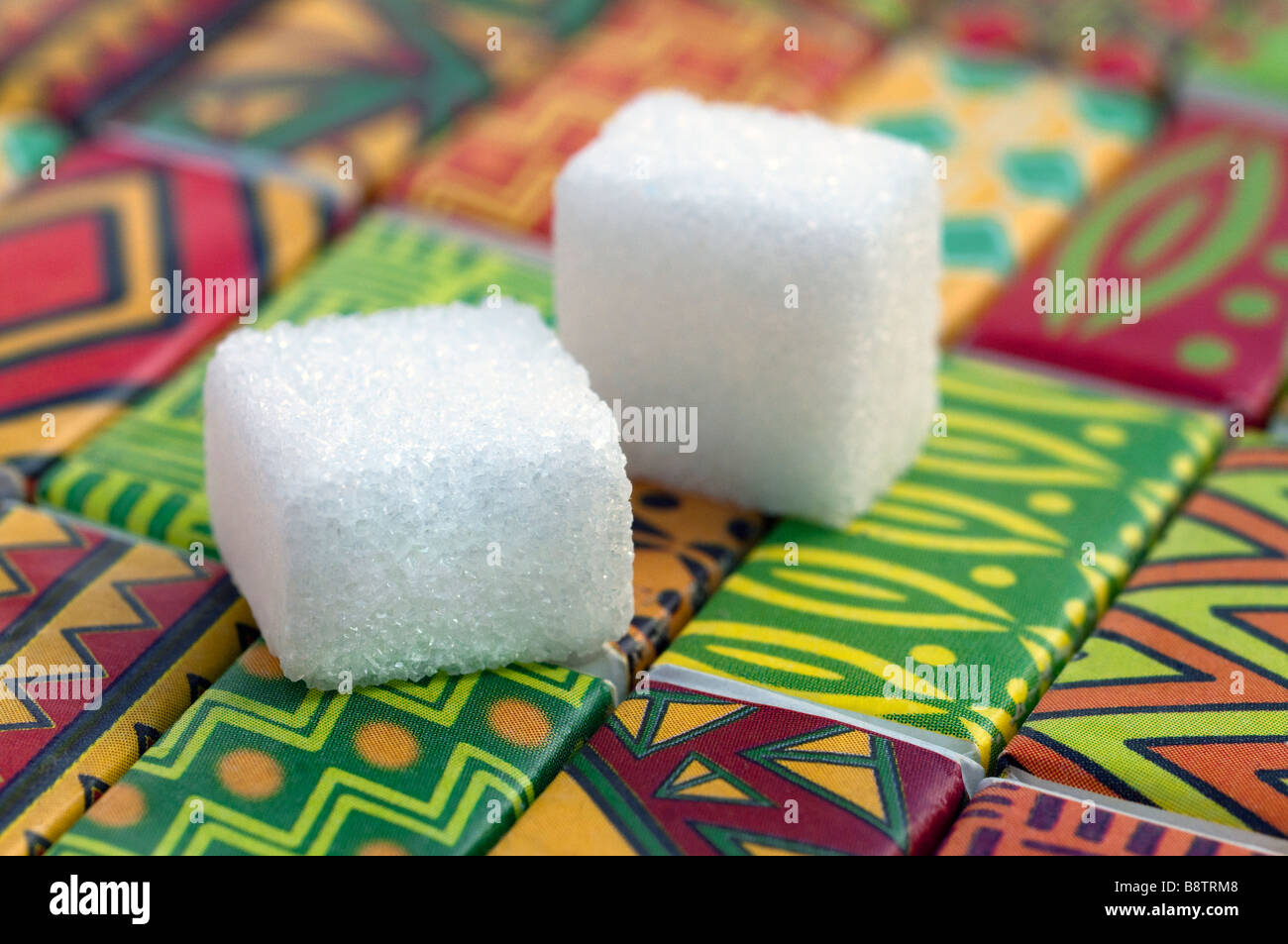 Zucker Würfel Papier Wrapper - Darstellung afrikanischer Kunst. Stockfoto