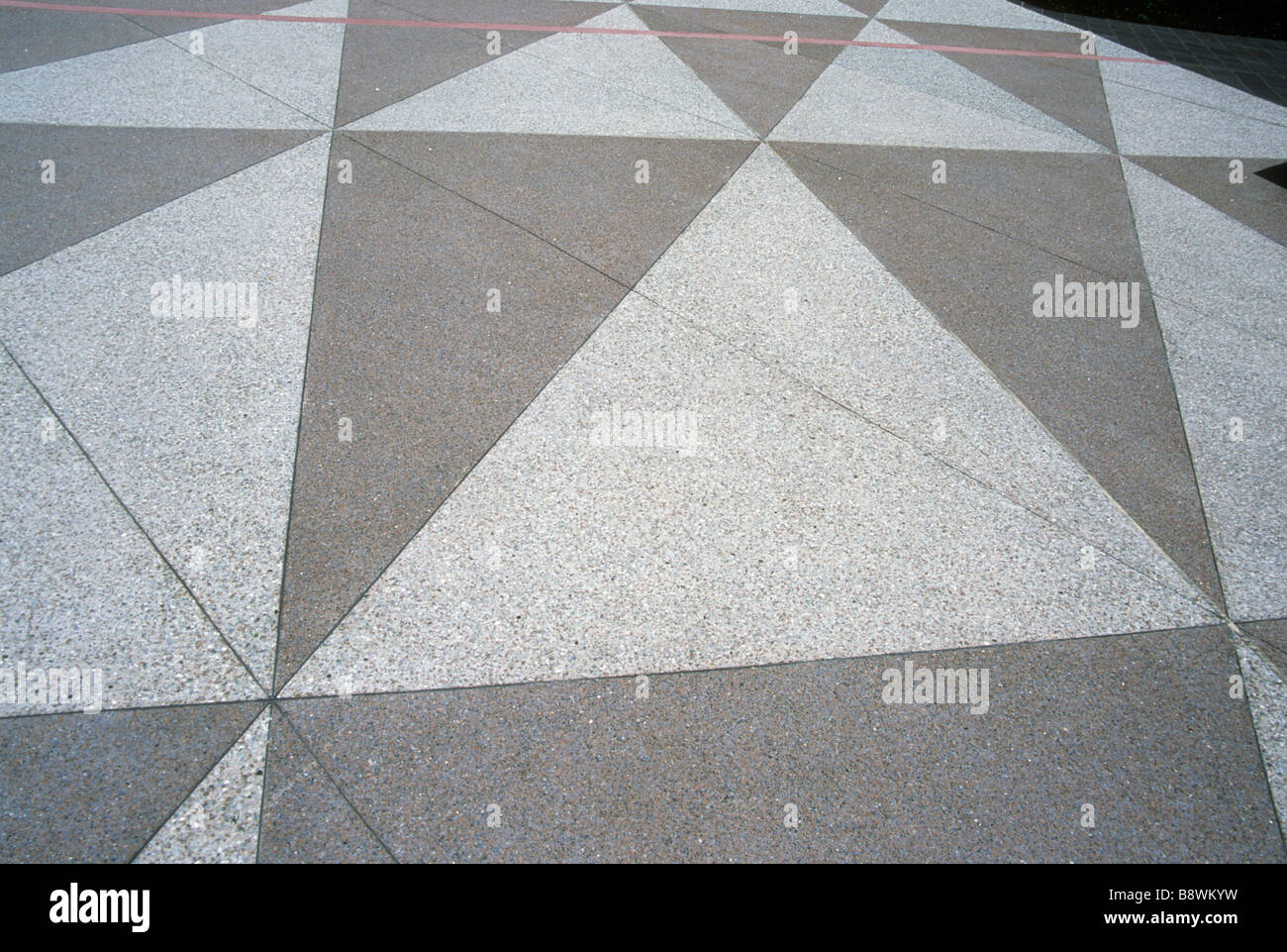 Dreieck-Form-Muster-Geometrie-Fußboden-Fliese wiederholen Wiederholung Thema Mathe trim terrazo Stockfoto