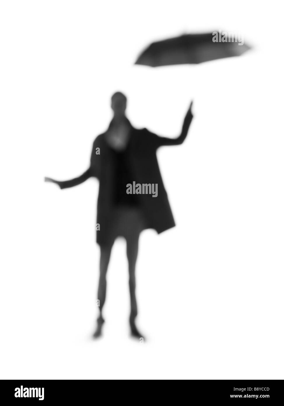 Silhouette eines Mannes mit einem Regenschirm. Stockfoto