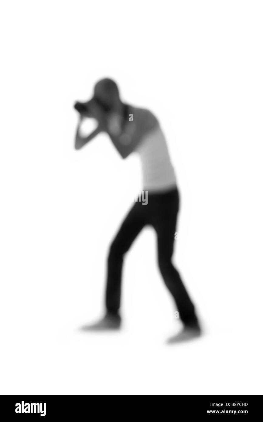 Silhouette einer Person, die Kamera hält. Stockfoto