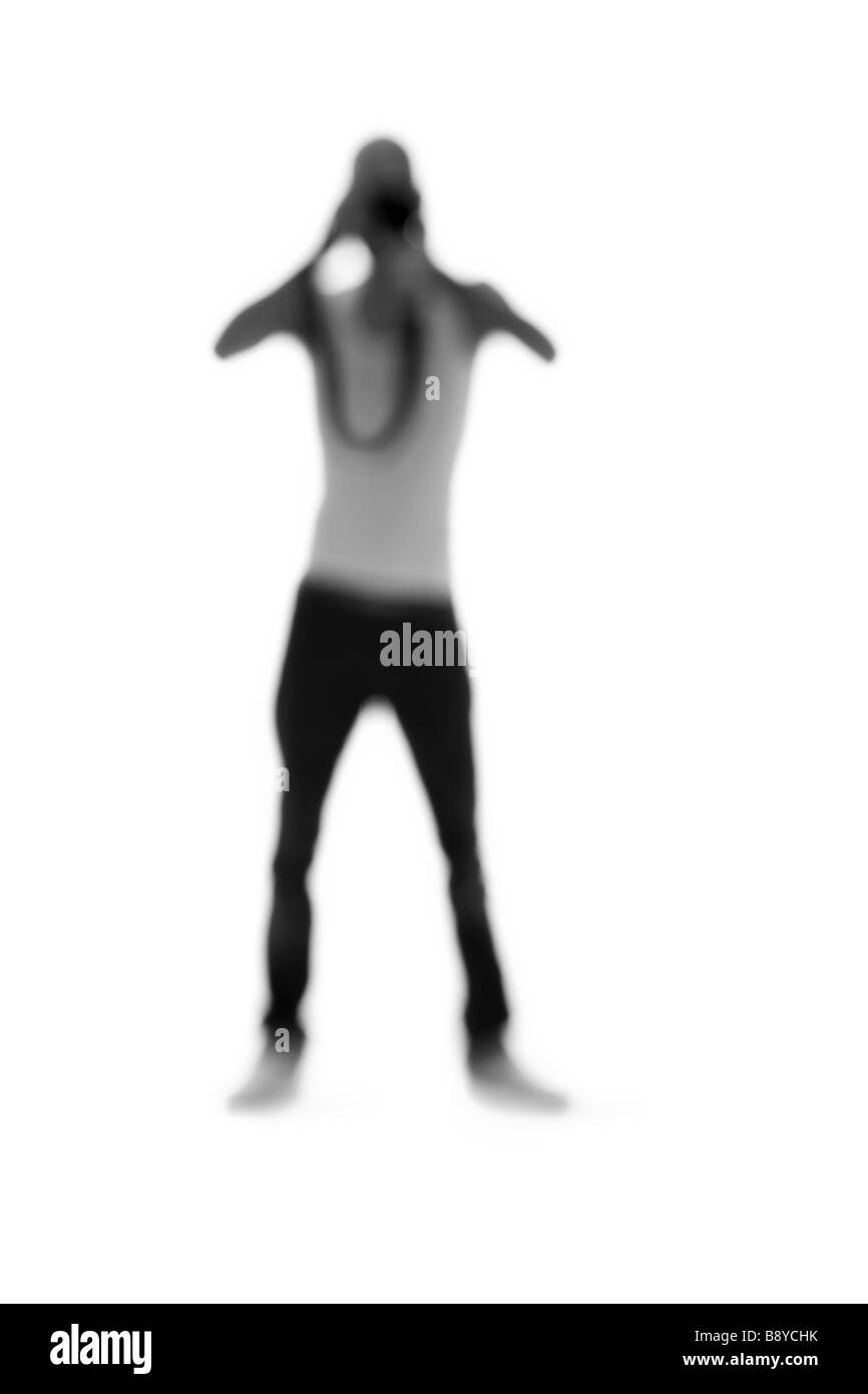 Silhouette einer Person, die Kamera hält. Stockfoto