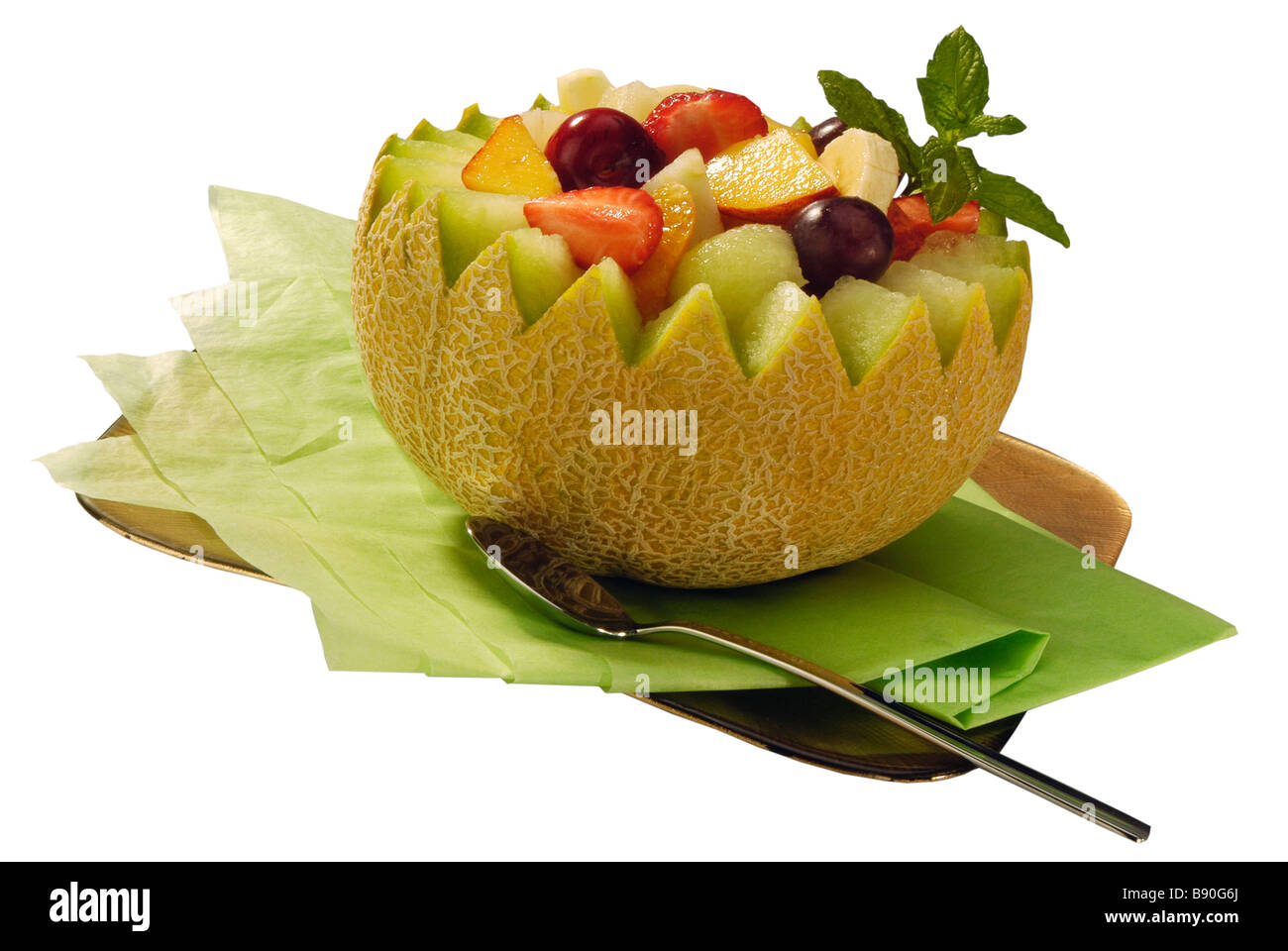 Obstsalat auf eine Melone [Clipping-Pfad] Stockfoto