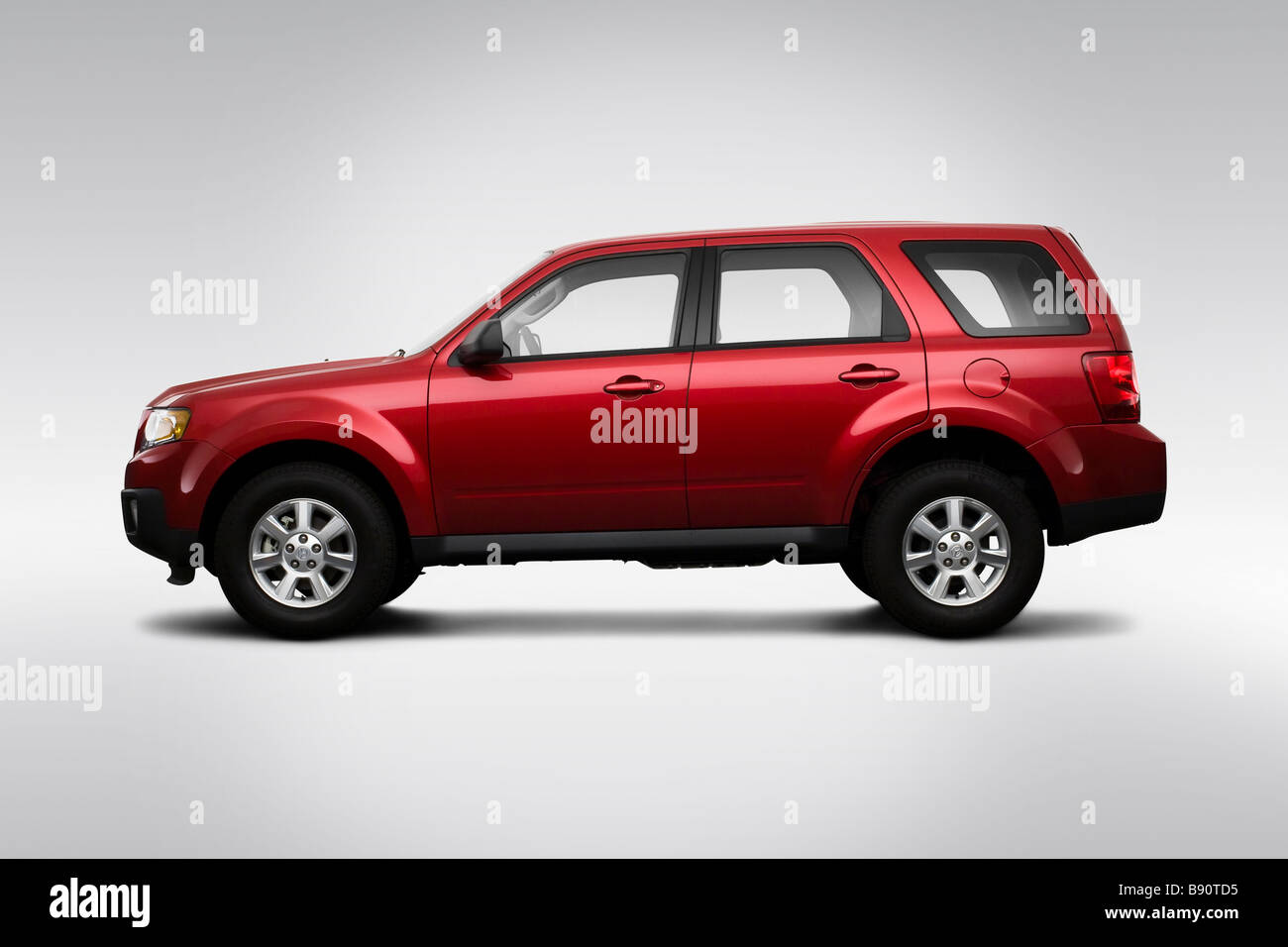 2009 Mazda Tribute ich Sport in rot - Treiber Seite Profil Stockfoto