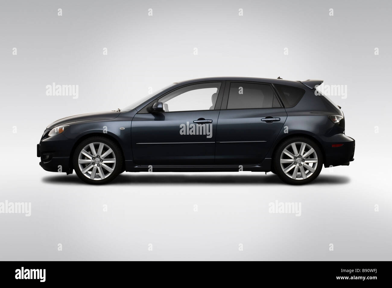 2009 Mazda MAZDASPEED3 Grand Touring grau - Treiber Seitenprofil Stockfoto