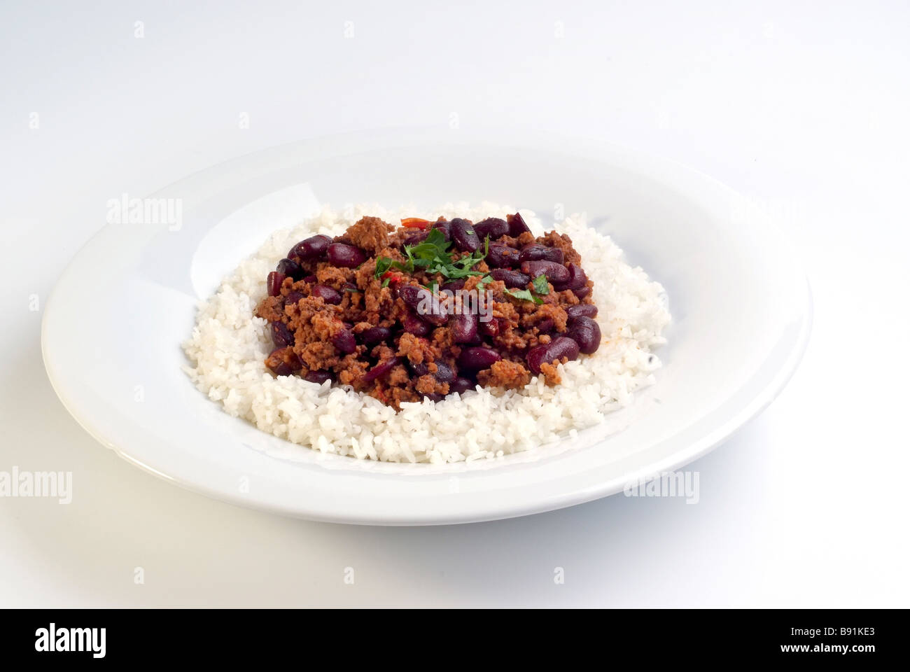 Teller mit Chili Con Carne Hackfleisch mit Bohnen und Reis Stockfoto