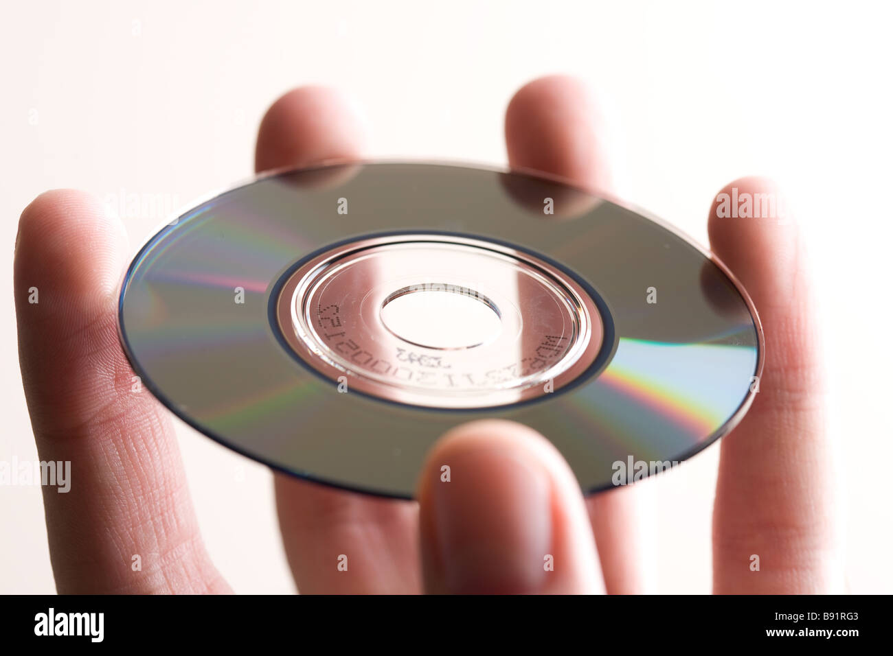 DVD, cd, Mini, Scheibe, Hand, Handgelenk, Daten, Datenbank, Festplatte, Festplatte, Informationstechnologien,, Server, Zentrum, Netzwerk, comm Stockfoto