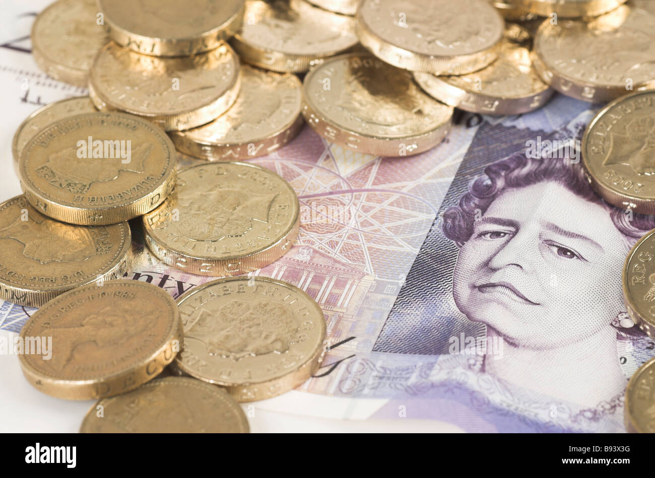 Pfund Stirling - Münzen und Banknoten Stockfoto