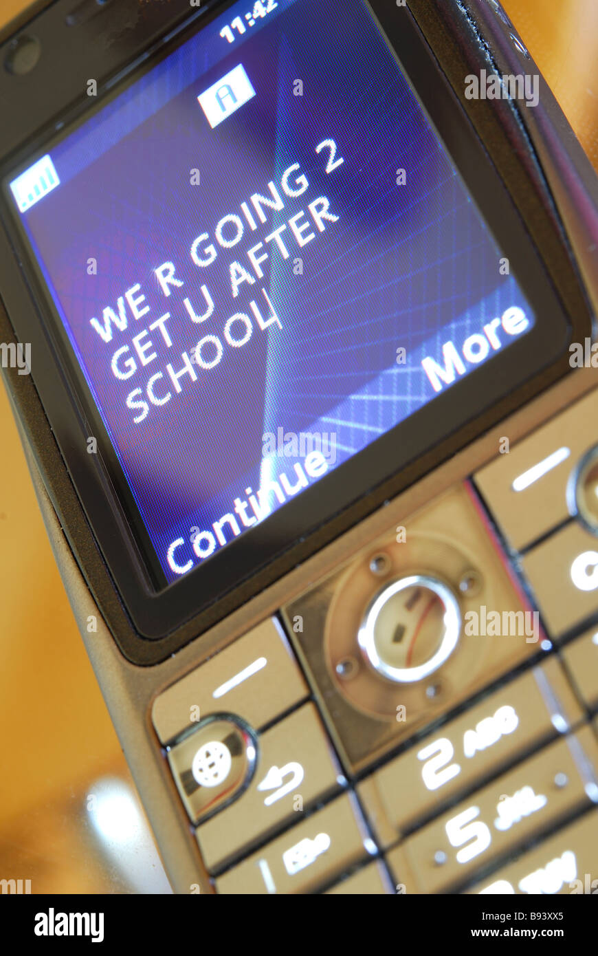 Mobbing per SMS. Stockfoto