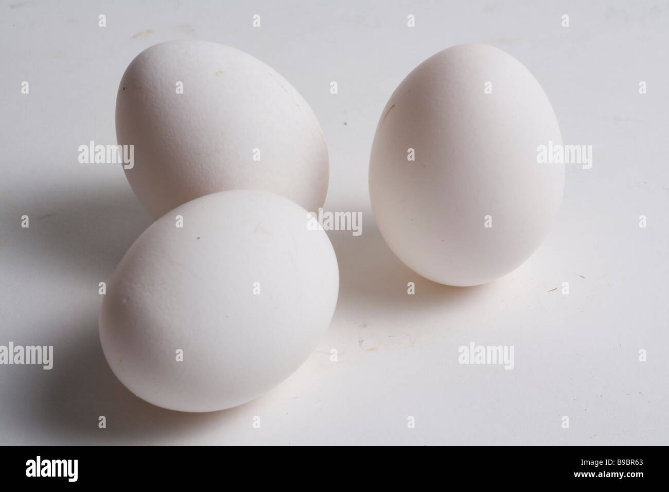 3 weißen Eiern Stockfoto
