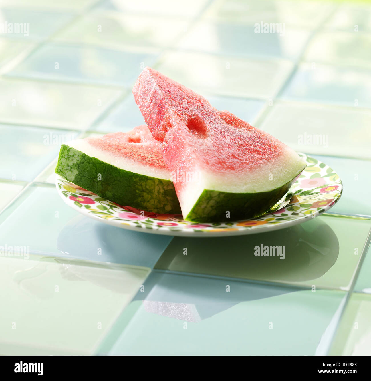 Wassermelone-Scheiben auf einen Teller. Stockfoto