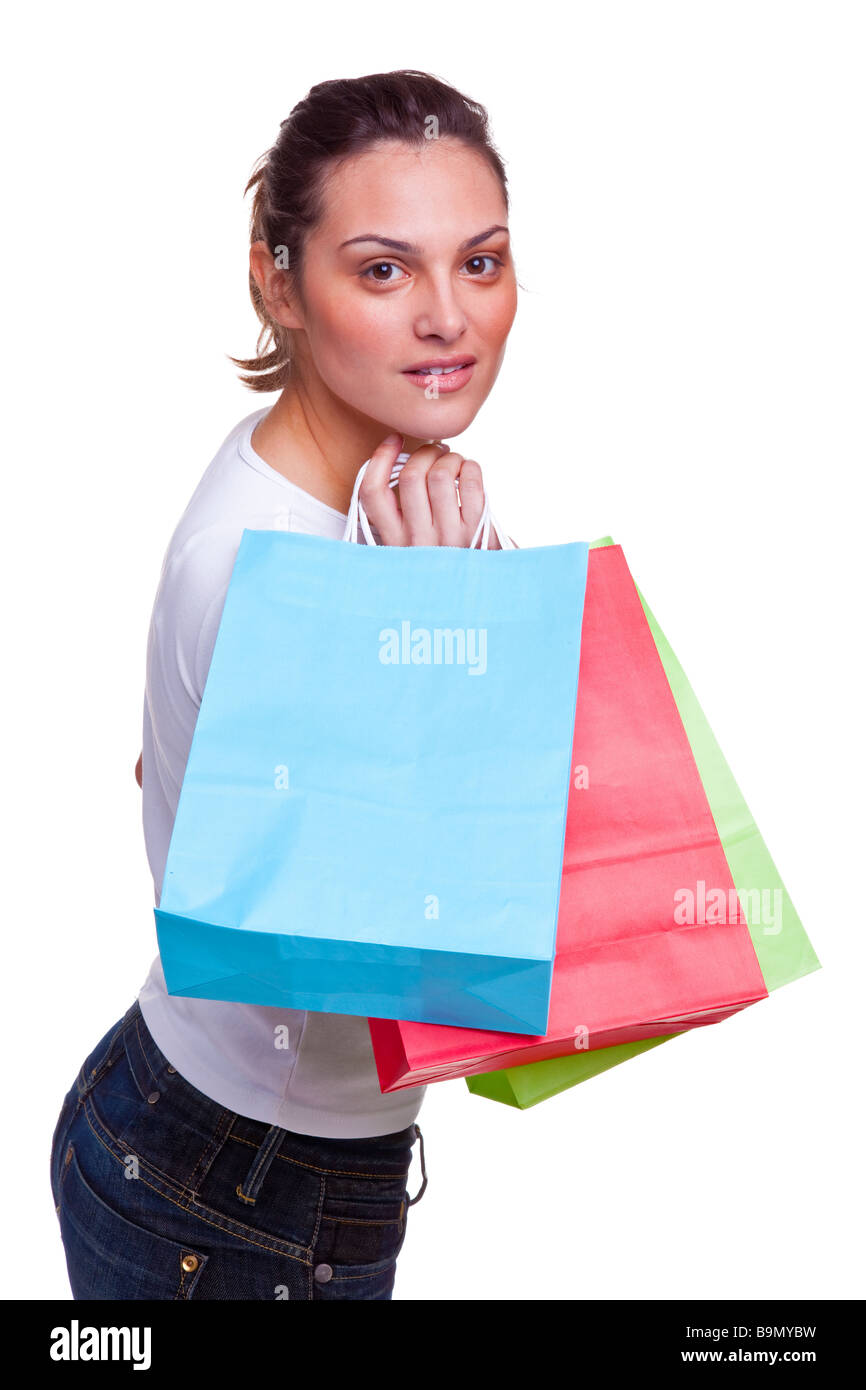 Hübsche junge Frau bunte leer Einkaufstaschen über die Schulter isoliert auf weißem Hintergrund Stockfoto