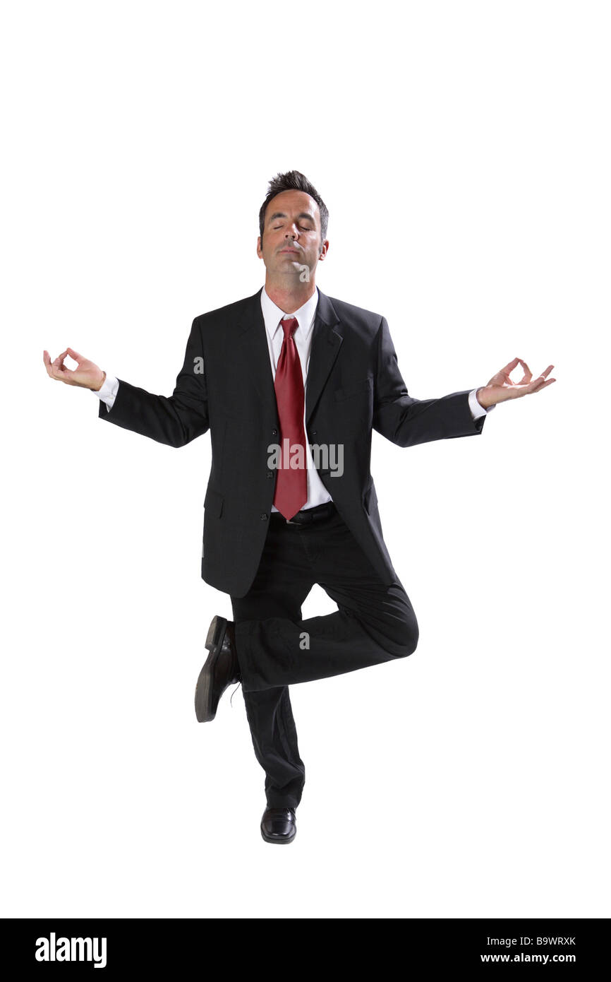 Geschäftsmann in Yoga-Pose isoliert auf weiss Stockfoto