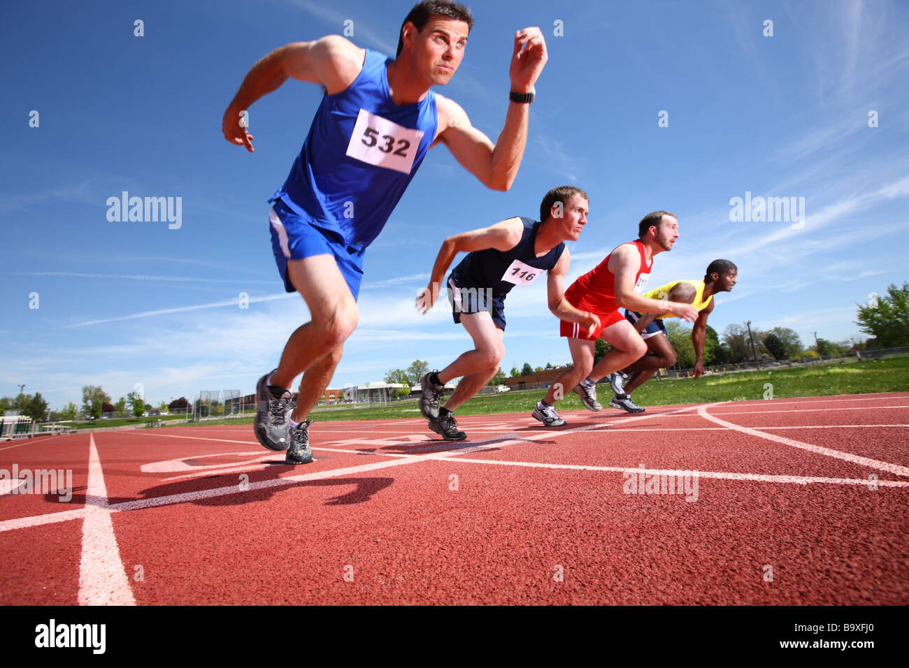 Track-Läufer am Start Stockfoto