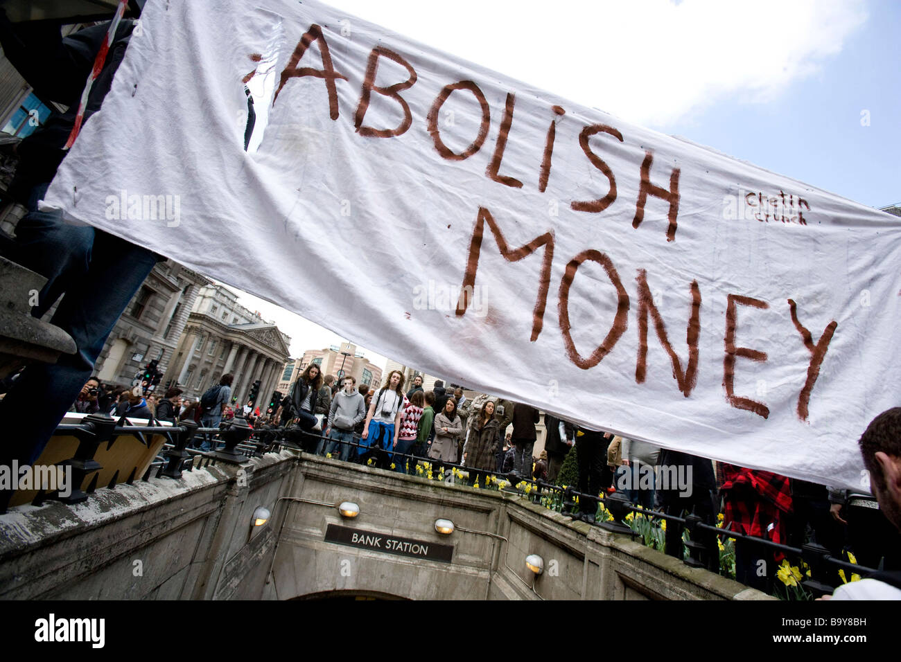 Abschaffung der Geld Banner Anti-kapitalistischen Gier-Demonstration vor der Bank of England Stockfoto