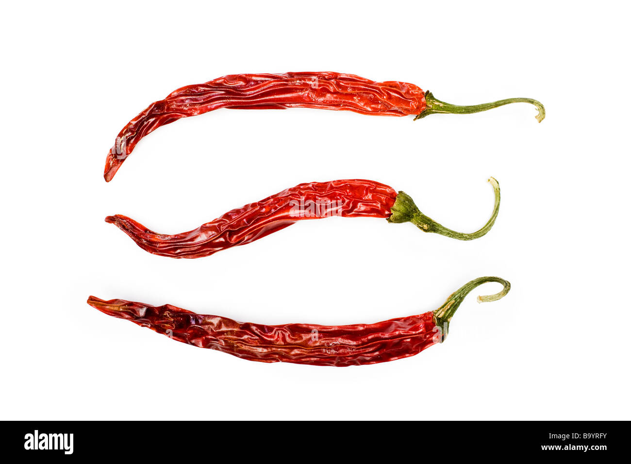 Drei rote Getrocknete Chilischoten Stockfoto