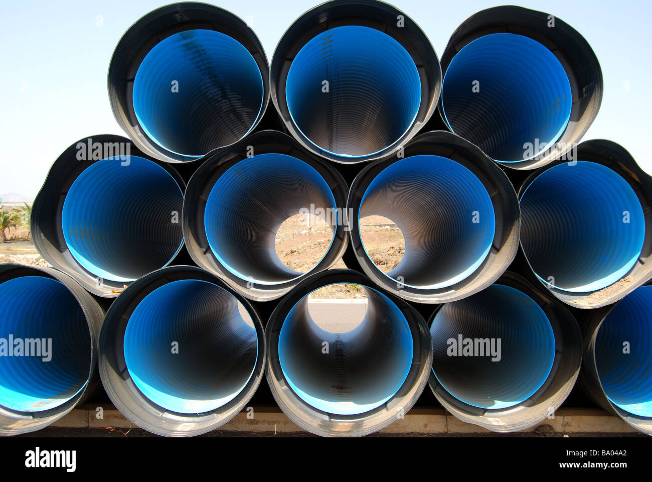 Kommerzielle Kunststoff Rohrleitungen, Puerto del Carmen, Lanzarote, Kanarische Inseln, Spanien Stockfoto