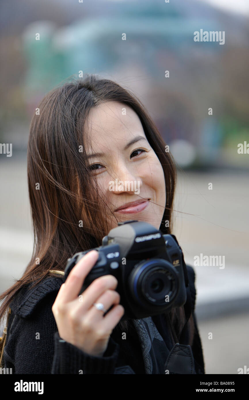 Junge Frau Fotograf Stockfoto