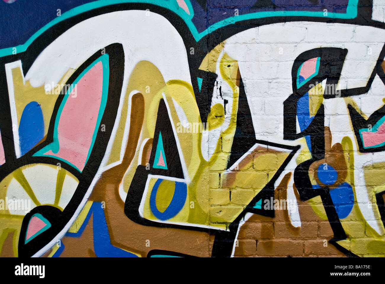 Abstrakten Graffiti-Detail auf der strukturierten Ziegelmauer Stockfoto
